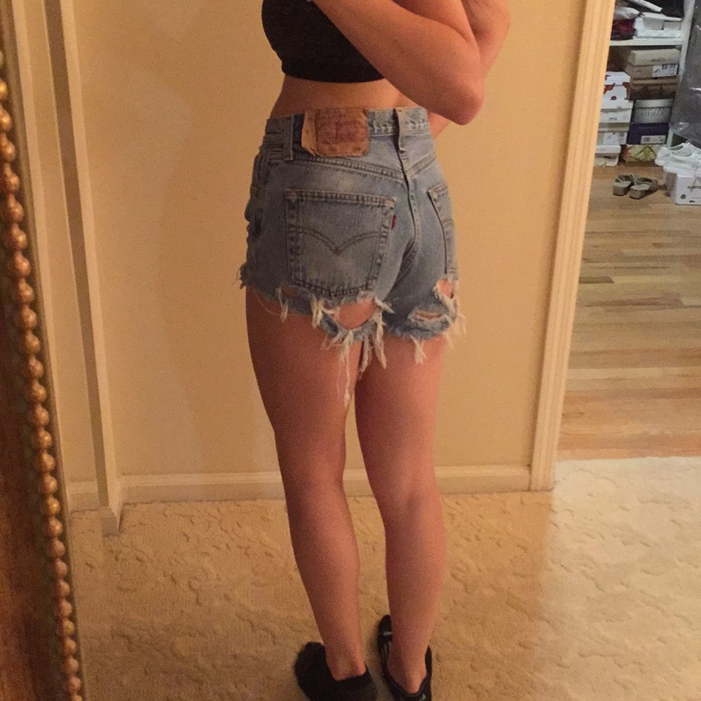 Vintage Levi Jean shorts with rip in butt